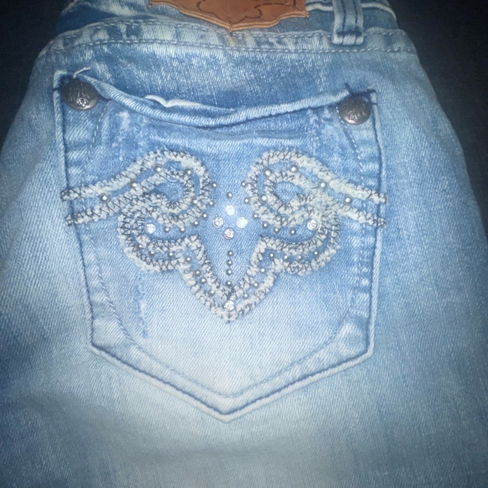Flare Express bedazzle pocket jeans